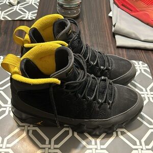 Used men’s Jordan 9 black and yellow retro